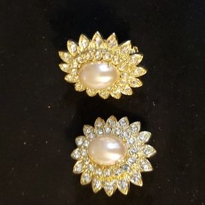 Faux pearl and rhinestone earrings.